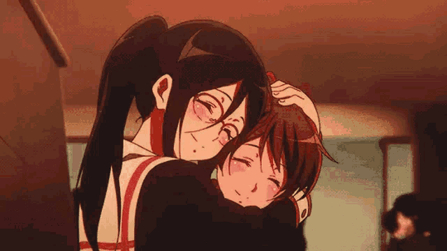 a couple of anime girls hugging each other in a hallway