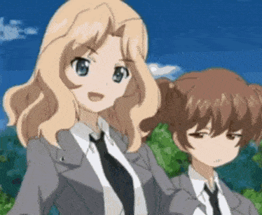 a couple of anime girls standing next to each other