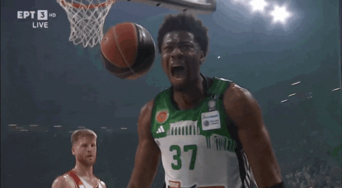 a basketball player wearing a green jersey with the number 37 on it