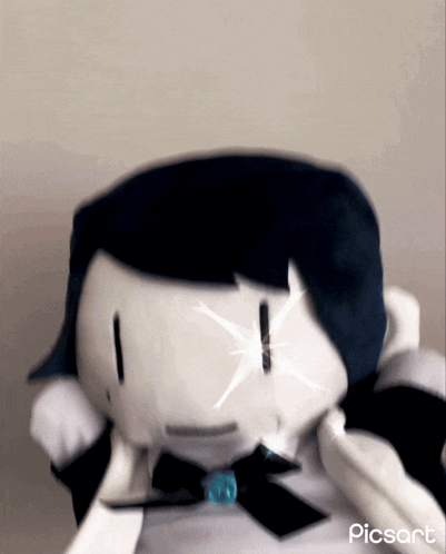 a picture of a stuffed animal with the word picsart on the bottom right