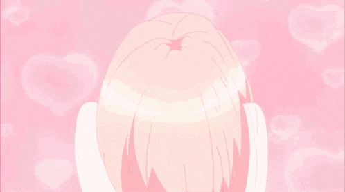 a girl is making a face with her hands in front of her face on a pink background