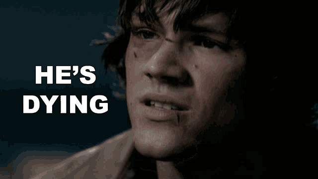 a close up of a man 's face with the words " he 's dying " behind him