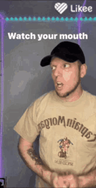 a man wearing a hat and a t-shirt that says ' watch your mouth ' on it