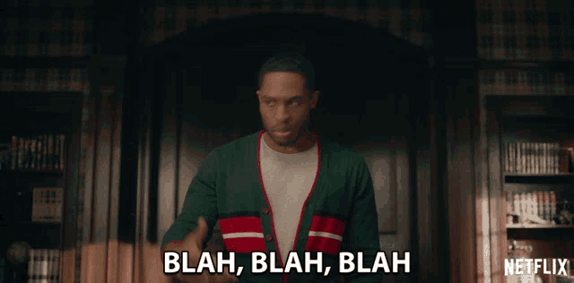 a man says blah blah blah in a dark room