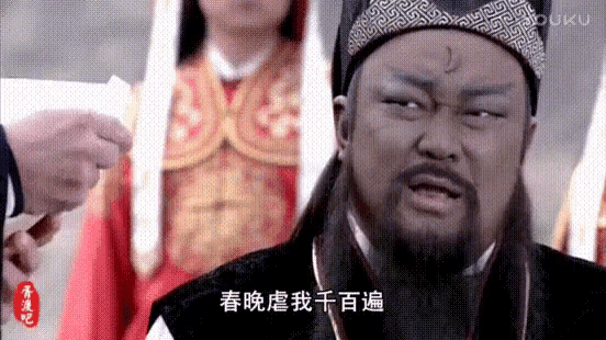 a man with a beard and a hat is making a funny face in a chinese language .