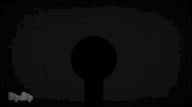a black silhouette with a red smile on it