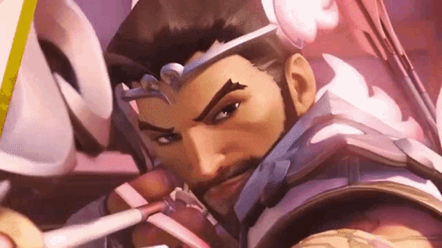 a close up of a cartoon character with a beard holding a sword and looking at the camera .