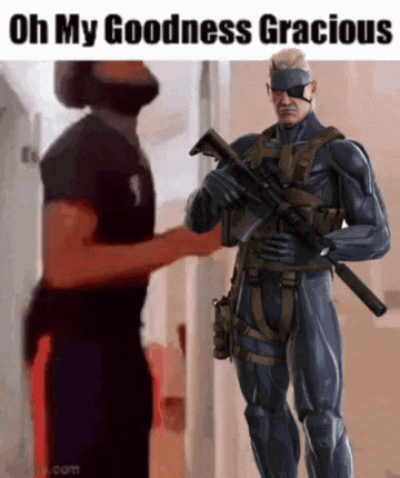 a man in a black shirt is shaking hands with a soldier holding a gun ..
