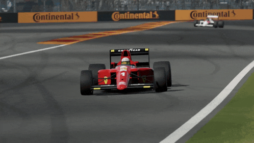 a red race car with a good year logo on the front