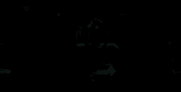 a man in a mask is playing the drums in a dark room