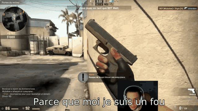 a person holding a gun in a video game with the words " parce que moi je suis un fou " below them