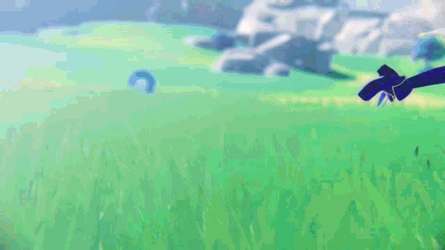 a girl in a blue skirt and black thigh highs is running in the grass