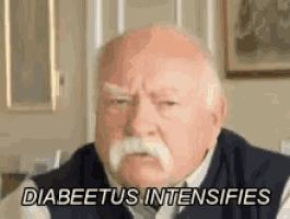 an elderly man with a mustache is sitting in a living room and saying `` diabetes intensifies '' .