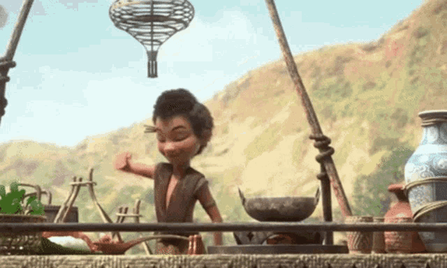 a cartoon character is standing in front of a stove with a hot air balloon hanging from it .