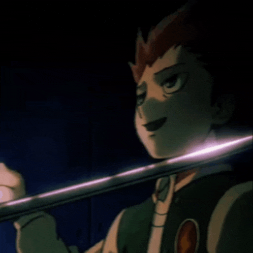 a man with his eyes closed is holding a sword in his hand