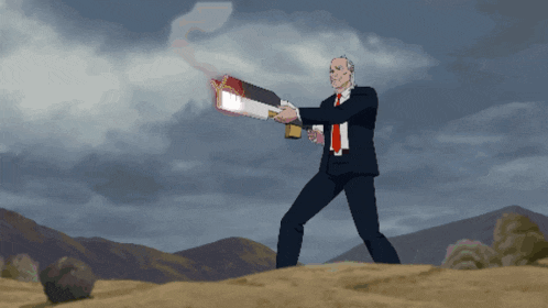 a man in a suit and tie holding a gun