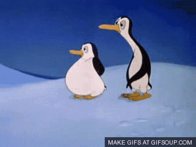 two penguins are standing next to each other in the snow with a make gifs at gifsoup.com button