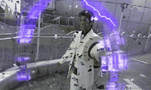 a man in a white suit stands in front of a purple lightning bolt