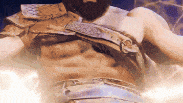 a close up of a man 's torso with a beard