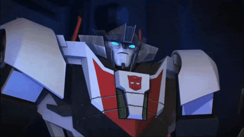 a close up of a robot with a red white and blue head