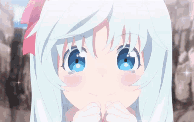 a girl with white hair and blue eyes is looking at the camera