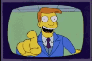 a cartoon of a man in a suit pointing at the camera