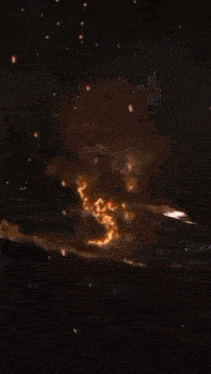 a glowing object in the dark with a few stars in the background