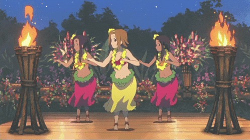 a girl in a yellow skirt is dancing in front of two torches