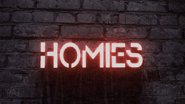 a brick wall with the words homies written on it