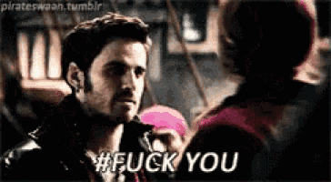 a man and a woman are standing next to each other and the man is saying fuck you .