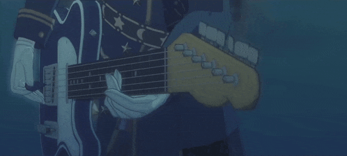 a person is playing a guitar that has the letter d on the neck