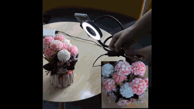 a picture of flowers on a table next to a picture of flowers on a box