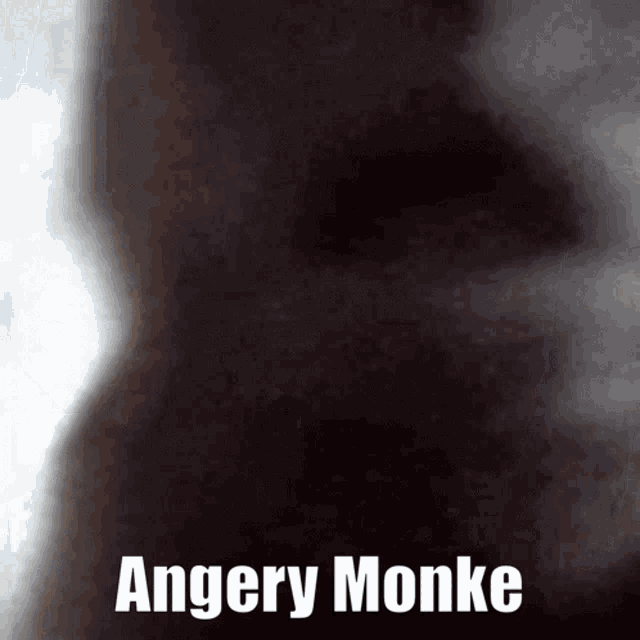 a black background with the words angery monke written in white