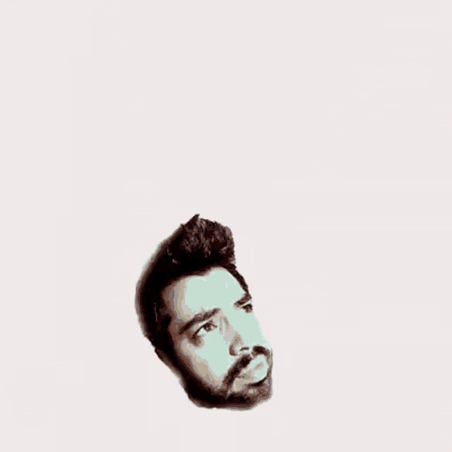 a man with a beard is surrounded by coffee beans on a white background