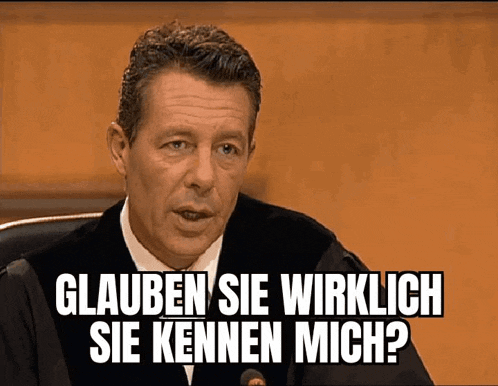 a man in a suit and tie says glauben sie wirklich sie kennen mich in german