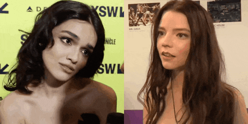two women are standing next to each other in front of a sxsw sign