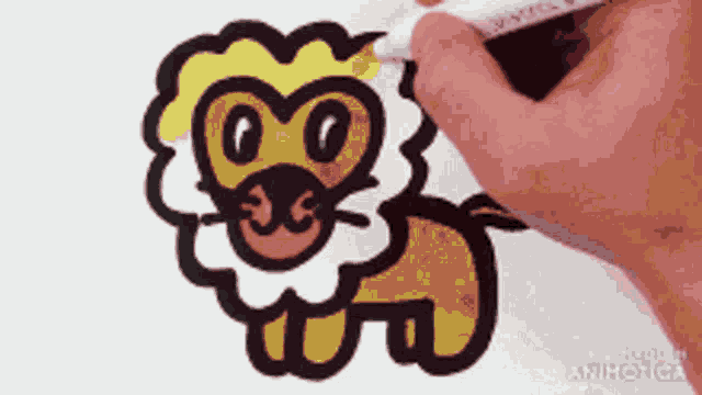 a person is drawing a lion on a piece of paper