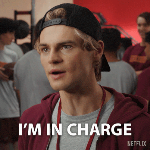 a man wearing a baseball cap says i 'm in charge netflix