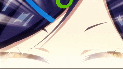 a close up of a person 's face with a green circle around their head
