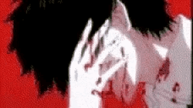 a black and white drawing of a person covering their face with their hands on a red background .