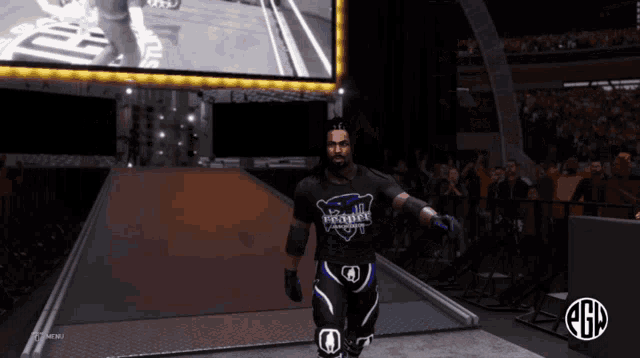 a wrestler wearing a black shirt that says reigns walks down a ramp