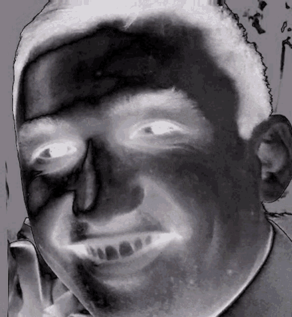a black and white drawing of a man 's face with his eyes closed