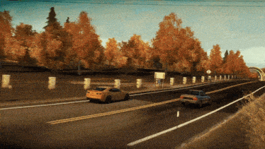 two cars are driving down a road with trees on the side of it