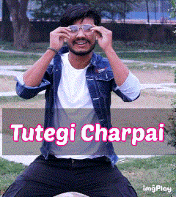 a man wearing sunglasses is kneeling down with the words tutegi charpai in the corner