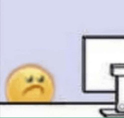 a yellow smiley face is standing in front of a computer monitor .