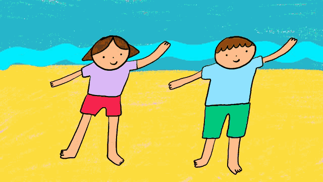 a boy and a girl are standing on a beach with their arms up