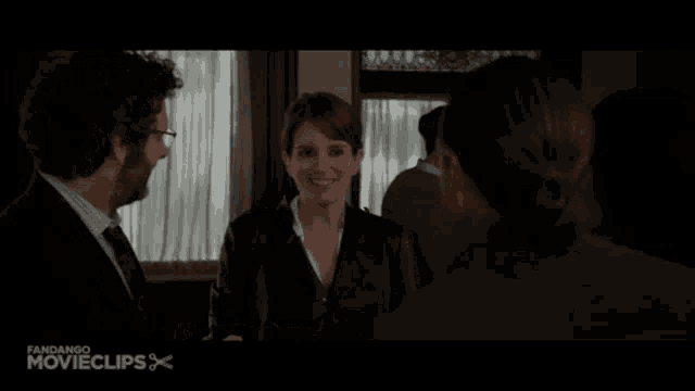 a movie clip from fandango movie clips shows a woman talking to two men