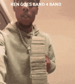 a man holding a stack of money with the words ren goes band 4 band below him