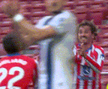 a man in a red and white striped shirt with the number 22 on it