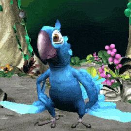 a blue parrot is standing on a rock in a jungle